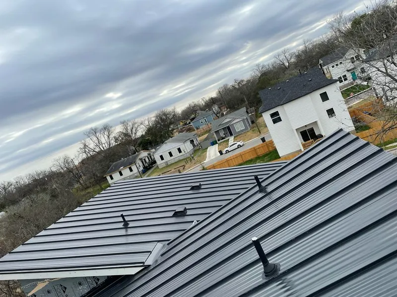 Standing seam metal roof panels with vents for Skylight Repair in Mount Airy